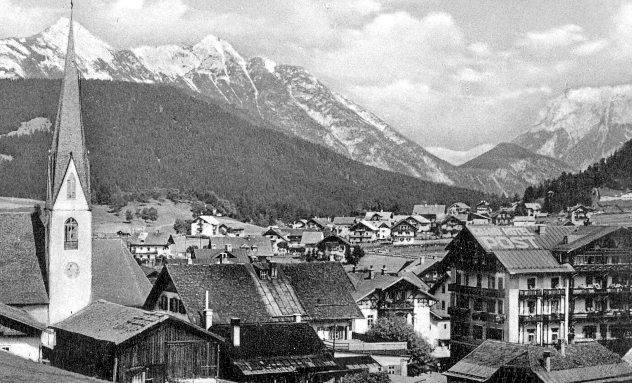 Historic postcard of Seefeld with the parish church of St. Oswald, Hotel Post and the Karwendel mountains behind